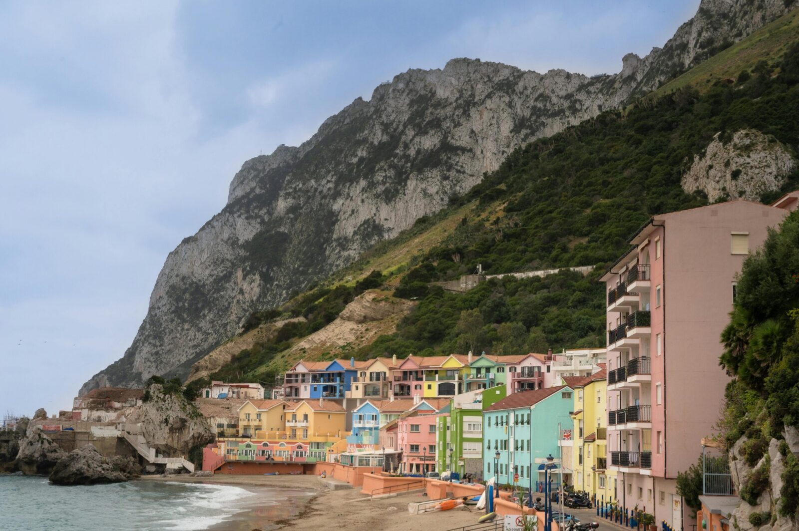 Residential neighbourhood beneath the Rock of Gibraltar beside the Mediterranean coast.