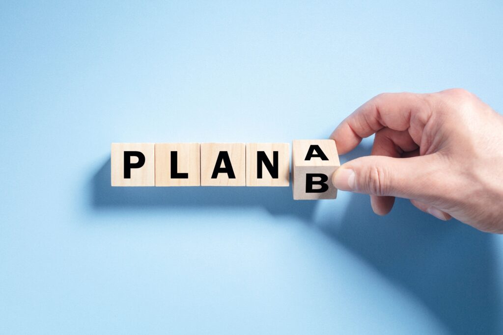 Plan A and Plan B concept blocks, representing golden visa strategy, alternative residency options, citizenship by investment and relocation planning for UK expats.
