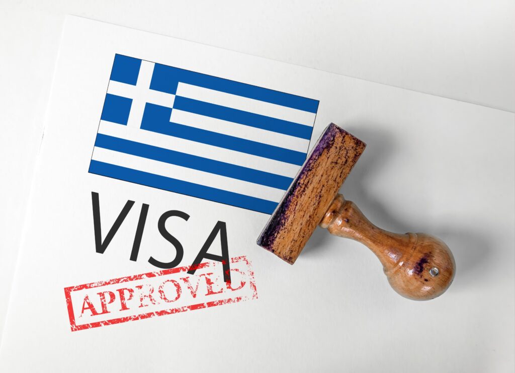 Greek visa approval document with national flag and stamp, illustrating residency pathways for UK nationals moving to Greece from UK including Golden Visa Greece.