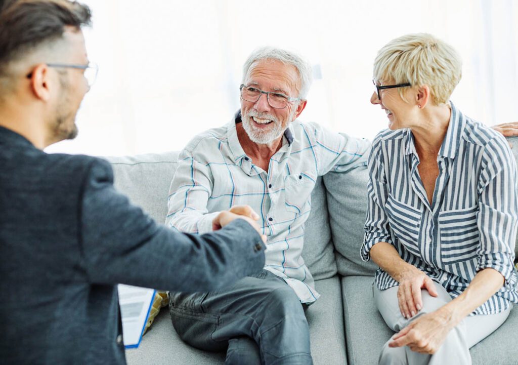 Couple investing business sale proceeds for long-term family wealth.