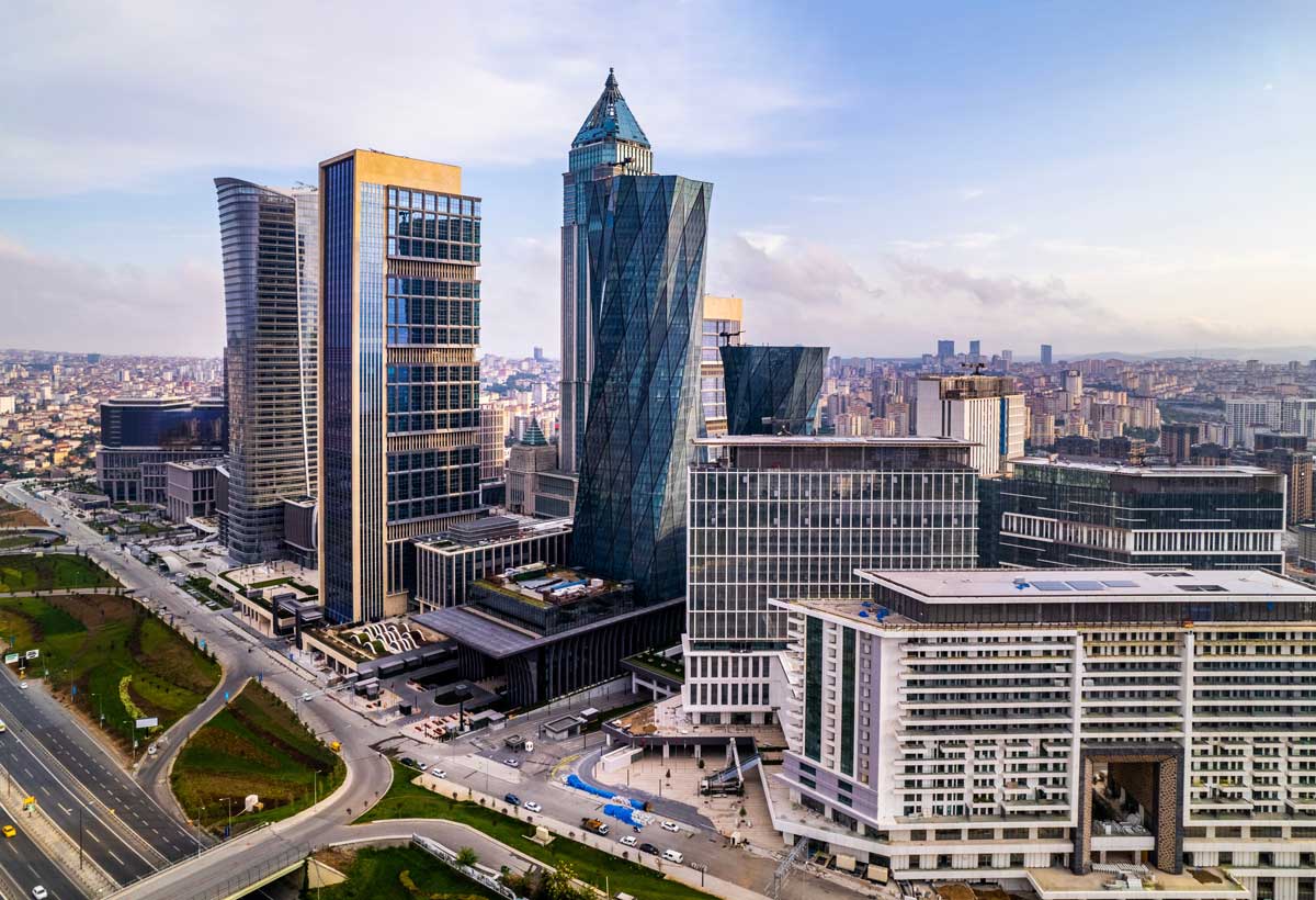 Modern skyline in Istanbul's Maslak financial district, showcasing premium commercial and residential developments that attract UK investors seeking off-plan property, rental income and Turkish Citizenship by Investment.