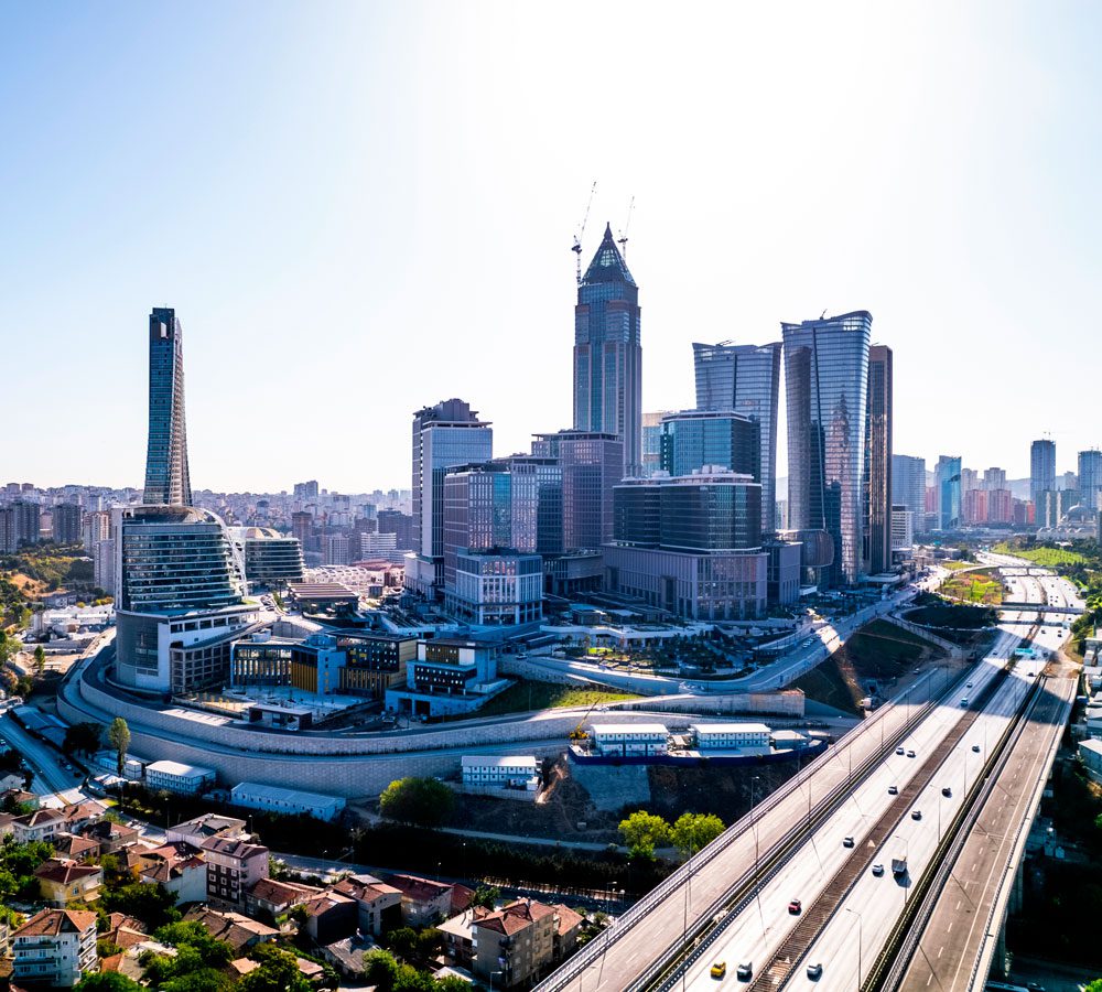 Modern Istanbul financial district skyline, representing tax advantages, property investment and financial planning for UK expats moving to Turkey.