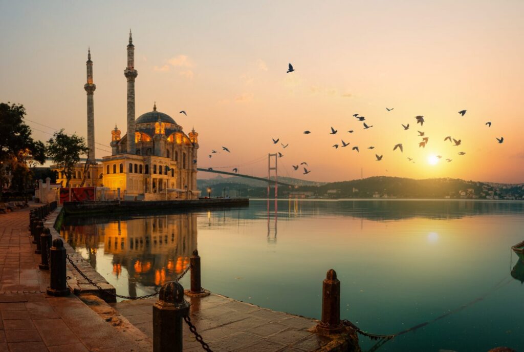 Retiring to Turkey from the UK overlooking Istanbul's Bosphorus with Ortaköy Mosque, a popular destination for British retirees.