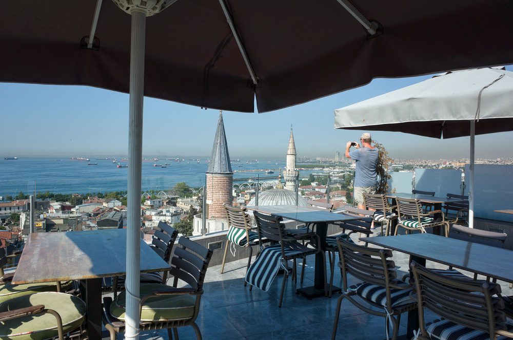View across Istanbul and the Bosphorus from a rooftop terrace, illustrating the safe, modern lifestyle enjoyed by many British expats living in Turkey.